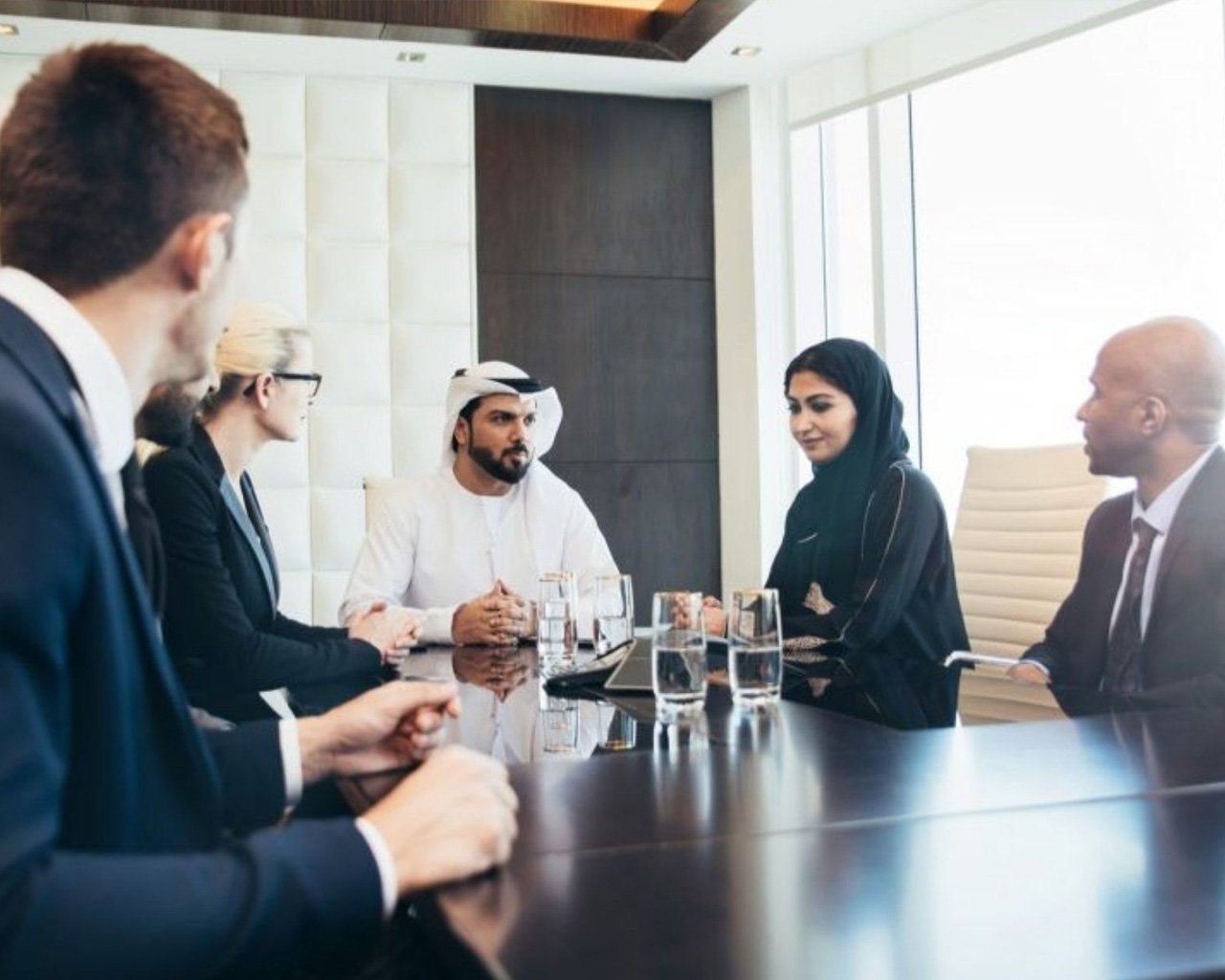 Interview panel with a candidate in a Dubai boardroom